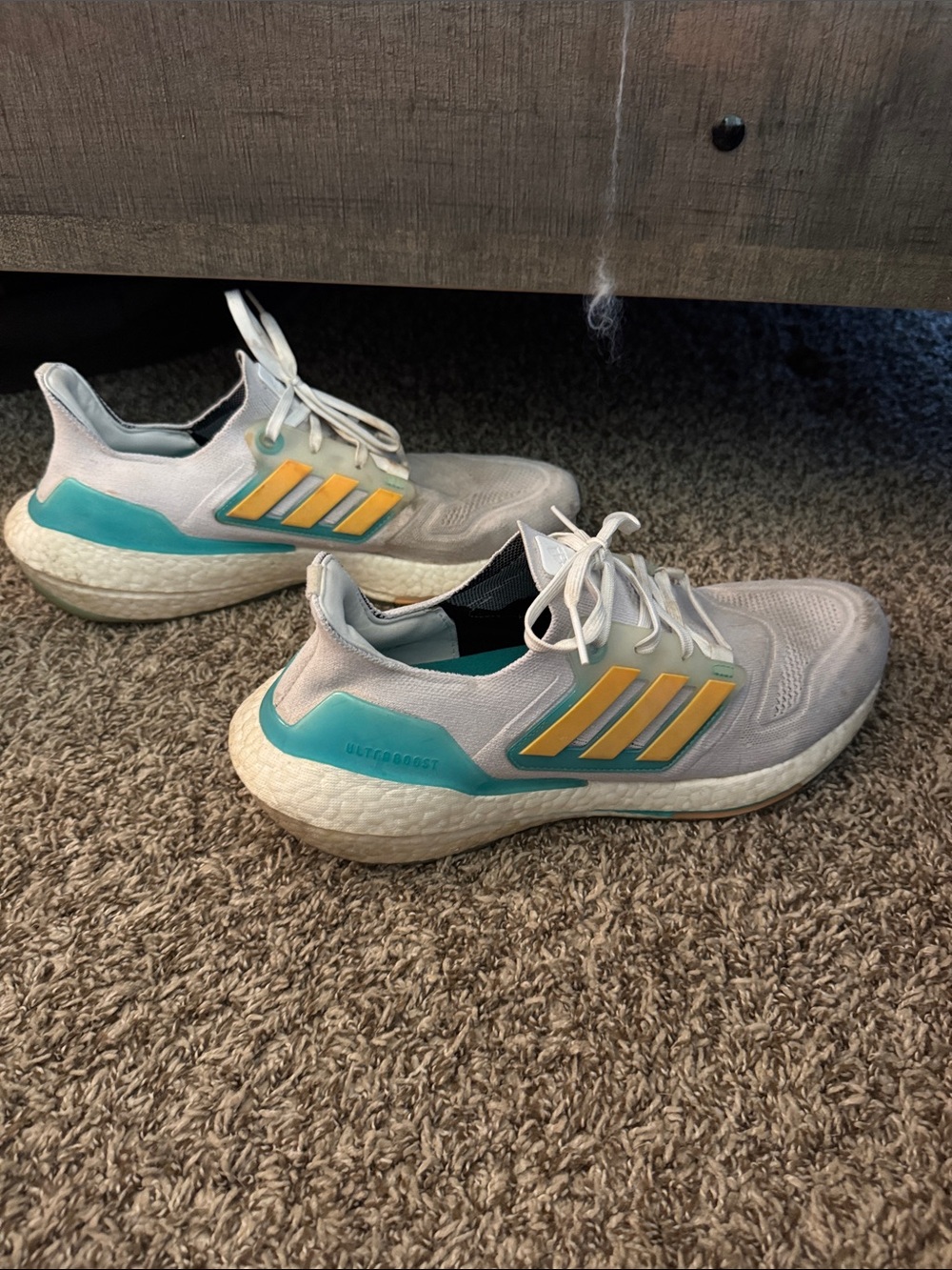 adidas white and Teal Heel and Yellow Stripes tennis shoes